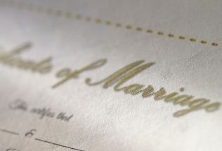 Promotional image for NRIWAY apostille services, featuring a young woman with luggage, famous global landmarks, and service highlights.